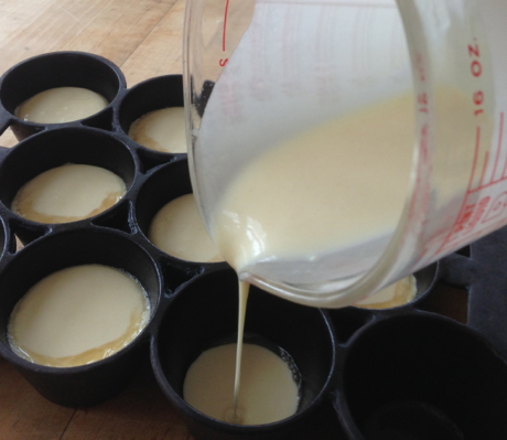 pouring popover batter into preheated cups